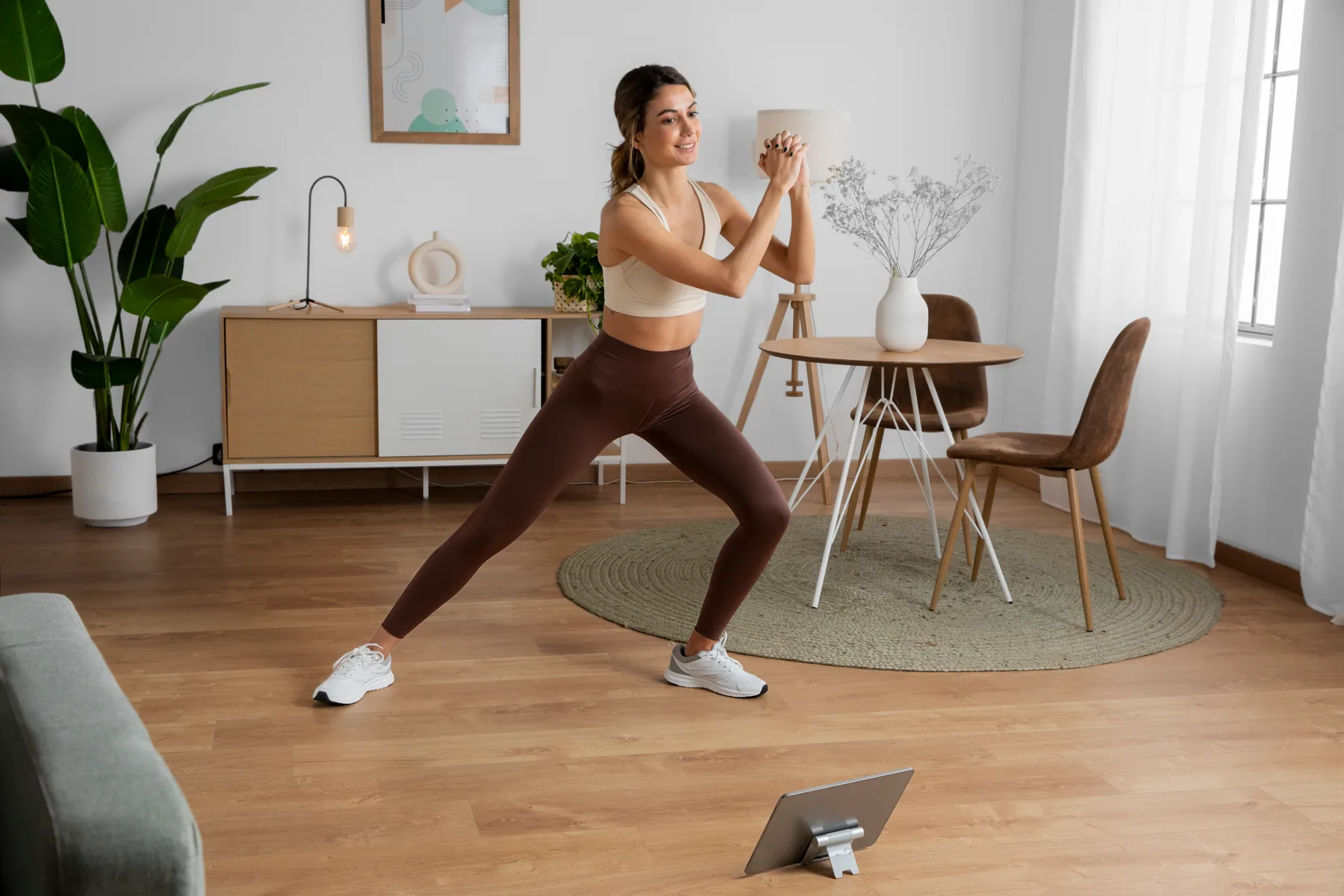 Woman doing a strength workout at home