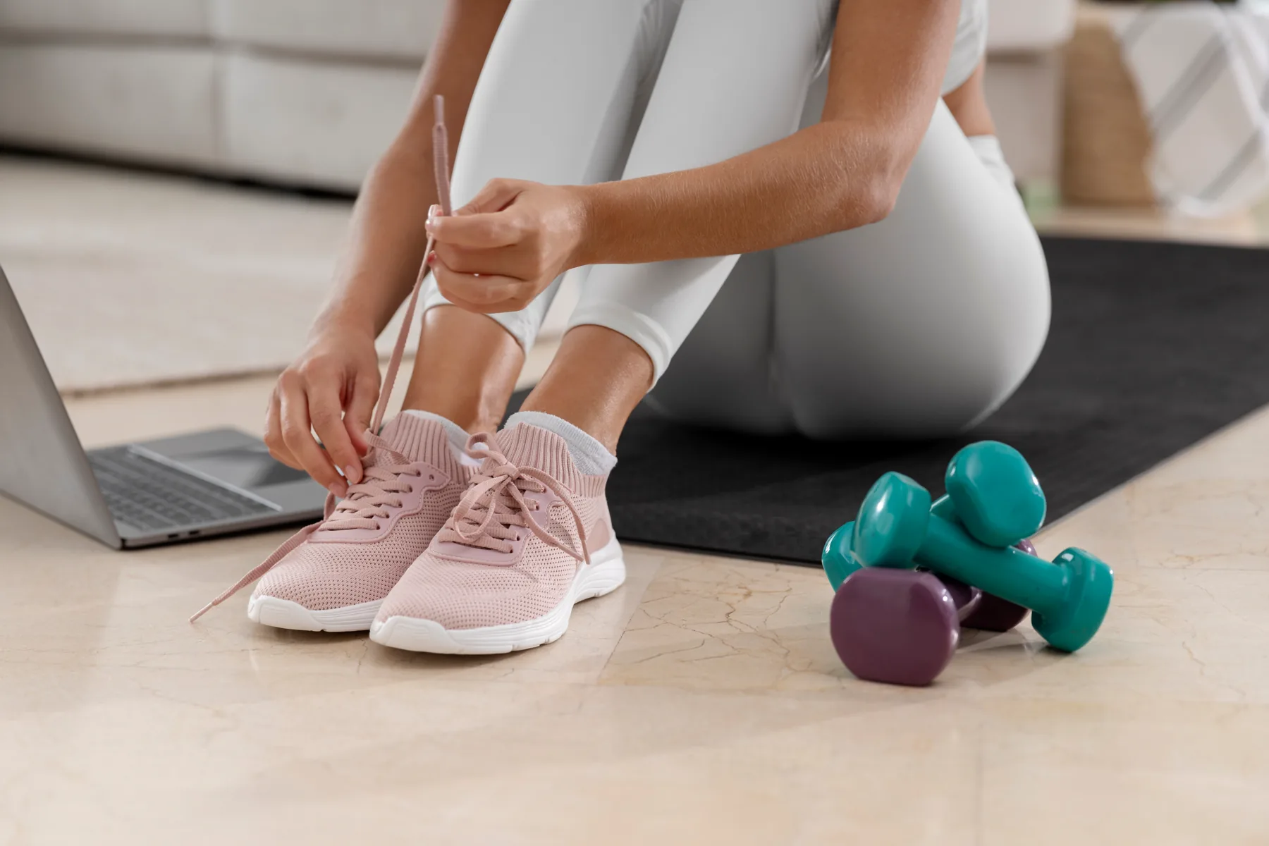 Woman preparing for a home workout